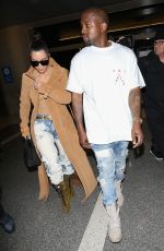 KIM KARDASHIAN and Kanye West at LAX Airport in Los Angeles 05/19/2016