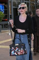 KIRSTEN DUNST in Jeans Out in Cannes 05/09/2016
