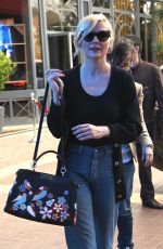 KIRSTEN DUNST in Jeans Out in Cannes 05/09/2016