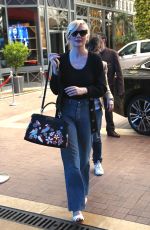 KIRSTEN DUNST in Jeans Out in Cannes 05/09/2016