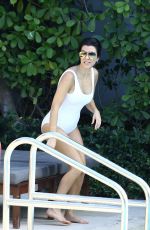 KOURTNEY KARDASHIAN in Swimsuit at a Pool in Miami 05/02/2016