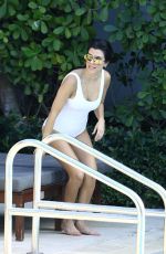 KOURTNEY KARDASHIAN in Swimsuit at a Pool in Miami 05/02/2016