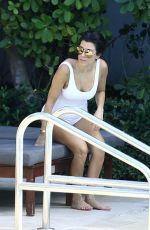 KOURTNEY KARDASHIAN in Swimsuit at a Pool in Miami 05/02/2016