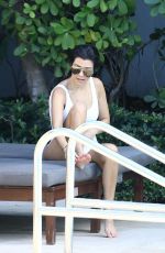 KOURTNEY KARDASHIAN in Swimsuit at a Pool in Miami 05/02/2016