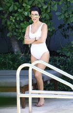 KOURTNEY KARDASHIAN in Swimsuit at a Pool in Miami 05/02/2016
