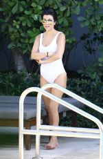 KOURTNEY KARDASHIAN in Swimsuit at a Pool in Miami 05/02/2016