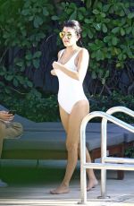 KOURTNEY KARDASHIAN in Swimsuit at a Pool in Miami 05/02/2016