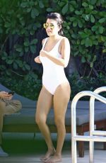 KOURTNEY KARDASHIAN in Swimsuit at a Pool in Miami 05/02/2016