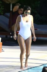 KOURTNEY KARDASHIAN in Swimsuit at a Pool in Miami 05/02/2016