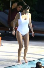 KOURTNEY KARDASHIAN in Swimsuit at a Pool in Miami 05/02/2016