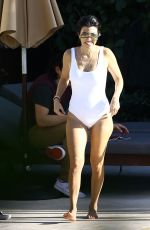 KOURTNEY KARDASHIAN in Swimsuit at a Pool in Miami 05/02/2016