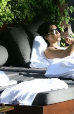 KOURTNEY KARDASHIAN in Swimsuit at a Pool in Miami 05/02/2016