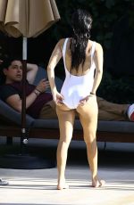 KOURTNEY KARDASHIAN in Swimsuit at a Pool in Miami 05/02/2016