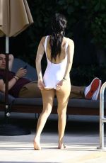 KOURTNEY KARDASHIAN in Swimsuit at a Pool in Miami 05/02/2016
