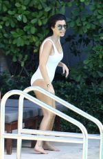 KOURTNEY KARDASHIAN in Swimsuit at a Pool in Miami 05/02/2016