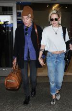 KRISTEN STEWART and ALICIA CARGILE at LAX Airport in Los Angeles 05/19/2016