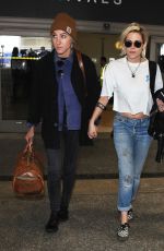 KRISTEN STEWART and ALICIA CARGILE at LAX Airport in Los Angeles 05/19/2016