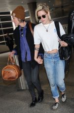 KRISTEN STEWART and ALICIA CARGILE at LAX Airport in Los Angeles 05/19/2016