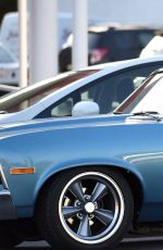 LADY GAGA Drives Her Classic Car Out in Los Angeles 04/29/2016