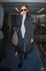 LILY COLLINS at LAX Airport in Los Angeles 04/30/2016