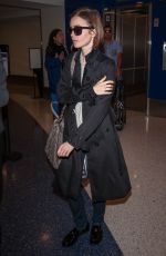 LILY COLLINS at LAX Airport in Los Angeles 04/30/2016