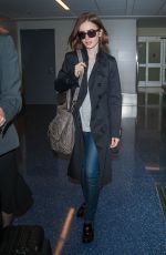 LILY COLLINS at LAX Airport in Los Angeles 04/30/2016