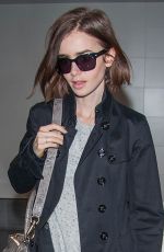 LILY COLLINS at LAX Airport in Los Angeles 04/30/2016