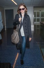 LILY COLLINS at LAX Airport in Los Angeles 04/30/2016