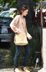 LILY COLLINS Heading to Mao