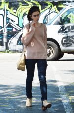 LILY COLLINS Heading to Mao