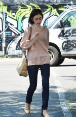 LILY COLLINS Heading to Mao