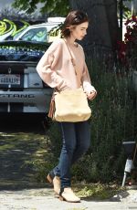 LILY COLLINS Heading to Mao