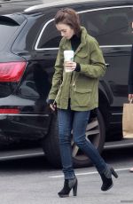 LILY COLLINS Leaves Starbucks in Los Angeles 05/10/2016