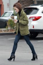 LILY COLLINS Leaves Starbucks in Los Angeles 05/10/2016