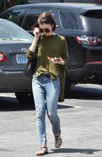 LILY COLLINS Out in Los Angeles 04/29/2016