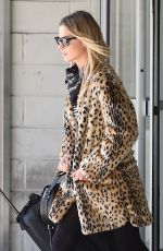 MARGOT ROBBIE Leaves JFK Airport in New York 04/30/2016