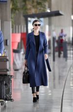 MIRANDA KERR at Charles De Gaulle Airport in Paris 05/21/2016