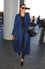 MIRANDA KERR at LAX Airport in Los Angeles 05/20/2016