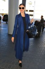 MIRANDA KERR at LAX Airport in Los Angeles 05/20/2016