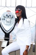 NAOMI CAMPBELL Lights Empire State Building in Honor of Red Nose Day in New York 05/24/2016