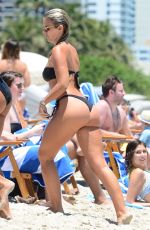 NATASHA OAKLEY and DEVIN BRUGMAN in Bikinis at a Beach in Miami 05/07/2016