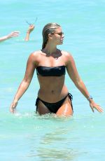 NATASHA OAKLEY and DEVIN BRUGMAN in Bikinis at a Beach in Miami 05/07/2016