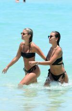 NATASHA OAKLEY and DEVIN BRUGMAN in Bikinis at a Beach in Miami 05/07/2016