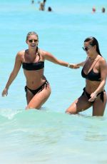 NATASHA OAKLEY and DEVIN BRUGMAN in Bikinis at a Beach in Miami 05/07/2016