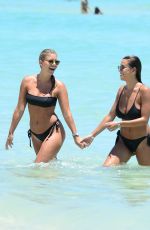 NATASHA OAKLEY and DEVIN BRUGMAN in Bikinis at a Beach in Miami 05/07/2016