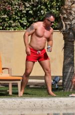 OLA JORDAN in Bikini Doing Yoga at a Pool 04/26/2016