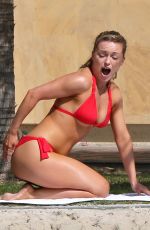 OLA JORDAN in Bikini Doing Yoga at a Pool 04/26/2016