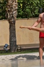 OLA JORDAN in Bikini Doing Yoga at a Pool 04/26/2016