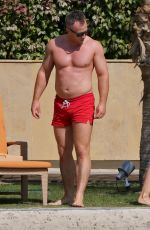 OLA JORDAN in Bikini Doing Yoga at a Pool 04/26/2016
