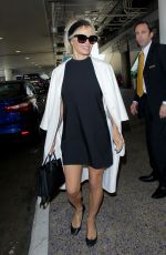 PAMELA ANDERSON at Los Angeles International Airport 05/17/2016